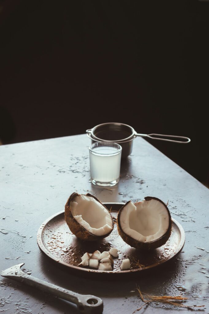 Almond milk and coconut water in glass jars as healthy smoothie recipes bases